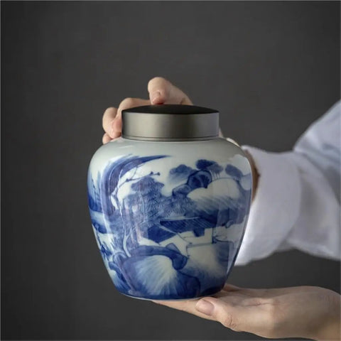 Solid Ceramic Tea Canister For Loose Leaf Storage, Airtight Kitchen Jar to keep coffee beans with a blue floral design.