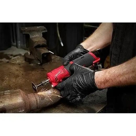Pro Grade M12 Fuel One Quarter Inch Cordless Straight Die Grinder Bare Tool With Three Mode Rpm Switch being used on metal work.