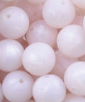 Premium Silicone Beads For Keychain Making And Jewelry Crafting Assorted Sizes With Hella Durable Build smooth pink round beads.