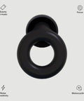 Top view of black concert ear plugs with high fidelity hearing protection and 18dB noise reduction showing a circular design.