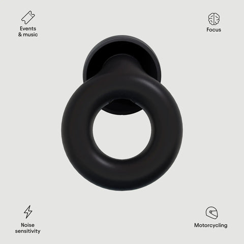 Top view of black concert ear plugs with high fidelity hearing protection and 18dB noise reduction showing a circular design.