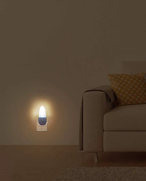Multicolor LED Night Light Set 4 Pack with Bubble Pattern and Dusk to Dawn Sensor illuminating living room near sofa