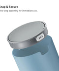 Lid detail of ultra compact 1.5L mini tabletop trash can with swing lid for bathroom vanity or desk space saving on blue container
