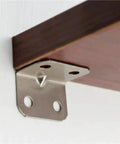 Metal L Bracket mounted on wood, part of Rock Solid Heavy Duty L Brackets No Sweat Assembly Furniture Hardware Pack.