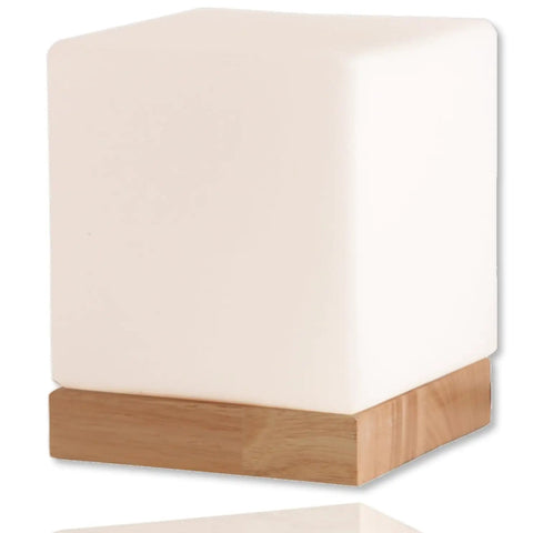 Square Glass Desk Lamp Cube LED Light With Warm 2700K Lit Glow 6W Bulb on natural wood base