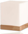 Square Glass Desk Lamp Cube LED Light With Warm 2700K Lit Glow 6W Bulb on wooden base, modern glass cube lamp for home decor.