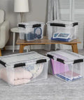 Built Like A Tank 34 Quart Gasket Storage Boxes With Lids stacked in living room, storing blankets, books, and headphones.