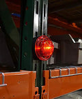 Emergency LED Road Flare Kit Set Of 3 With Magnetic Base Beacons on metal shelf, 360 degree red lights activated for safety.