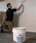 Man applying Heavy Duty Elastomeric Liquid Rubber Coating For Block And Wall Waterproofing 5 Gallon White Pro Grade Durable Sealant