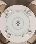 Top view of Large Glass Lazy Susan Turntable for kitchen dining table setup with place settings, smooth spin
