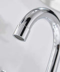 Close-up of a Chrome Finish Widespread Bathroom Sink Faucet with 8 Inch Spread for 3 Hole Vanities, curved spout detail.