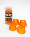 Premium 90A Medium Clear Orange Skateboard Truck Bushings Set With Two Top And Two Bottom Cushions shown with packaging