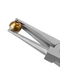 Close-up of round nose pliers holding a brass bead from 7 Piece Jewelry Pliers Set For Beading And Wire Wrapping Includes Needle Nose Pliers Round Nose Pliers Bent Nose Pliers And Wire Cutter Pro Grade Tool Kit Great For Beginners And Pros For Jewelry Making Beads And DIY Craft With Carrying Pouch