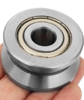 Tough As Nails Heavy Duty Sealed V Groove Track Roller Guide Bearing LV201ZZ 12 X 41 X 20 mm precision steel bearing in hand.