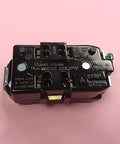 Straight Swap Nema 5 15R Duplex Wall Outlet 15 Amp 125 Volt UL Listed Electrical Receptacle top view showing brass contacts and wire slots.