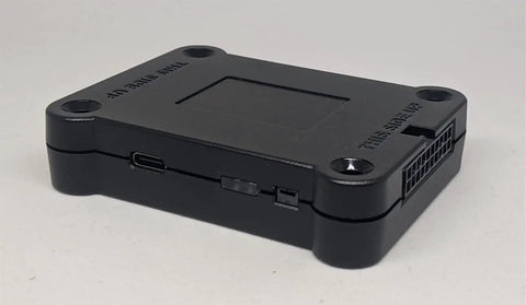 No Sweat Plug And Play CARB Emission Reporter With Lockstep Fuel Level Monitor, compact black device, USB port visible.