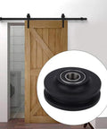 2 Pack Barn Door Sliding Roller Wheels Kit For DIY Sliding Door Project installed on wooden barn door with close-up of roller