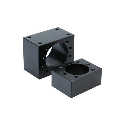 Pro Grade Nut For SFU Ball Screw Systems 45 steel housing, two black steel blocks with circular openings and bolt holes visible