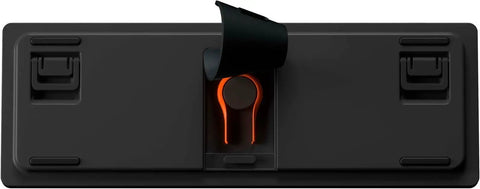 Close-up of the bottom of a Compact Sixty Percent Wireless Mechanical Gaming Keyboard showing magnetic switch with glow.
