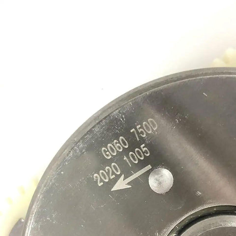 Close-up of G060 750D label on 36T nylon gear for fat tire e-bike hub motor replacement, shown in metal and plastic material.