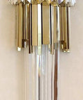 Sleek Led Wall Sconce Textured Crystal Glass Rod Shade Brushed Steel Frame close-up showcasing golden accents and clear rods.