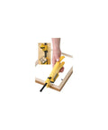 Rotating Head Framing Fitting Tool Point Driver For 4 Inserts in use on wood frame, close-up of slip-resistant grip.