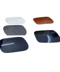 Sleek Exterior Ev Charging Port Cover For Vw Id.4. Gray, white, and brown plastic caps for vehicle charging ports in various angles.