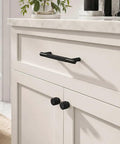 Grab These Totally Solid 24 Pack Aluminum Cabinet Knobs And Drawer Pulls Super Durable Black Hardware For Kitchen Cupboards And Dressers Brushed Brass Vibe Included on a white kitchen cabinet drawer.