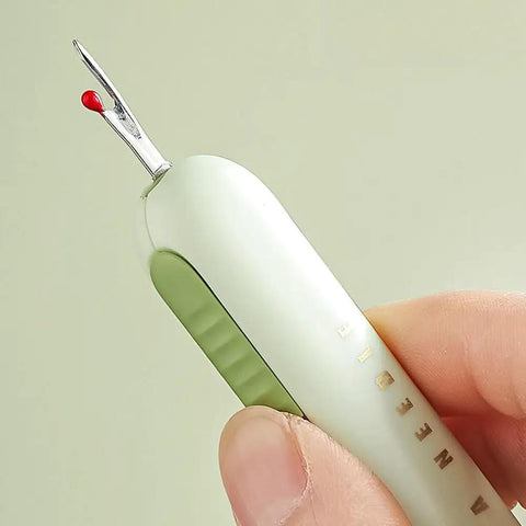 Hand holding a 3 Pack 2 In 1 Needle Threader And Seam Ripper Set For Sewing Threading And Seam Removal Must Have Handy Tool.