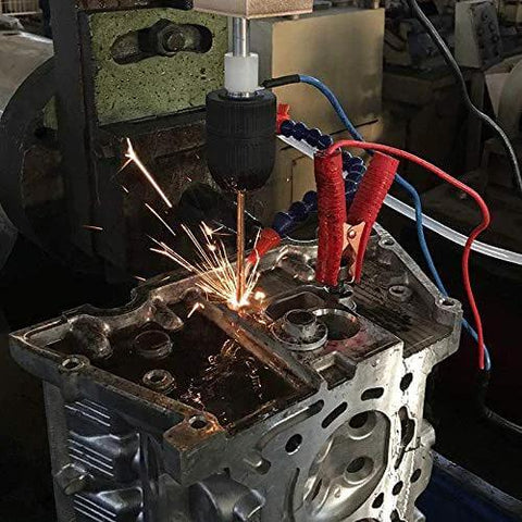 SFX EDM-8C 800W portable EDM tap burner; front view with sparks removing a broken tap from a metal block.