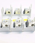 Pro Grade Rock Solid 3 Pole Fuse Holder Offering Hella Durable 100 Amp Rating And 600 Volt Ac Capacity For Heavy Duty Industrial Wiring And Quick Fit Panel Jobs, showing six fuse blocks with metal connectors.