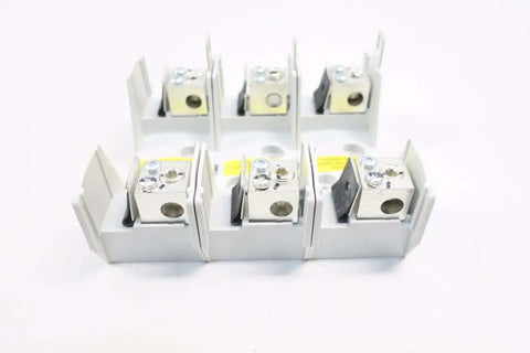 Pro Grade Rock Solid 3 Pole Fuse Holder Offering Hella Durable 100 Amp Rating And 600 Volt Ac Capacity For Heavy Duty Industrial Wiring And Quick Fit Panel Jobs, showing six fuse blocks with metal connectors.