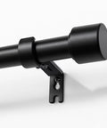 Heavy Duty Adjustable Curtain Rods For Windows 32 To 120 Inches Black 1 Inch Diameter Built To Last Sturdy Rods For Bedroom Kitchen And Sliding Glass Doors Easy Install Brackets Included close-up of black rod with bracket