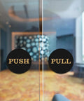 Two Inch Round Push Pull Door Signs Brushed Gold Set Of Two Durable Plastic With Strong Adhesive Foam Tape For Super Easy Install And Clear Legible Messaging In Offices Homes Or Commercial Doors on glass door