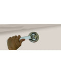 Hand holding Pro Grade Top Shelf Concealed Spray Nozzle Wrench Set Two Piece Universal 1/2 Inch Silver Fire Sprinkler Removal Tool.