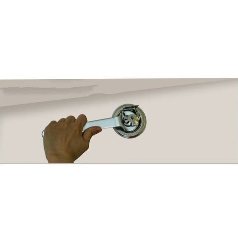 Hand holding Pro Grade Top Shelf Concealed Spray Nozzle Wrench Set Two Piece Universal 1/2 Inch Silver Fire Sprinkler Removal Tool.