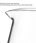 V shaped spout of Top Shelf Pour Over Coffee Dripper Stand, clear glass for fluent water discharge without floor drain.