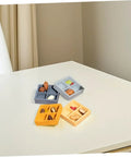 Four Grid Miniature Resin Storage Box Set For Dollhouses And Fairy Gardens with candy and nut ornaments on table
