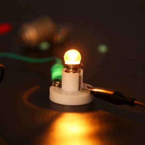 Glowing bulb from Kids DIY DC Motor Kit With 131 Pieces And 66 Gears Six Pack Bundle for STEM projects