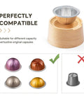 Perfectly compatible reusable silicone seal kit for converting Nespresso VertuoLine pods on wooden stand with capsule examples