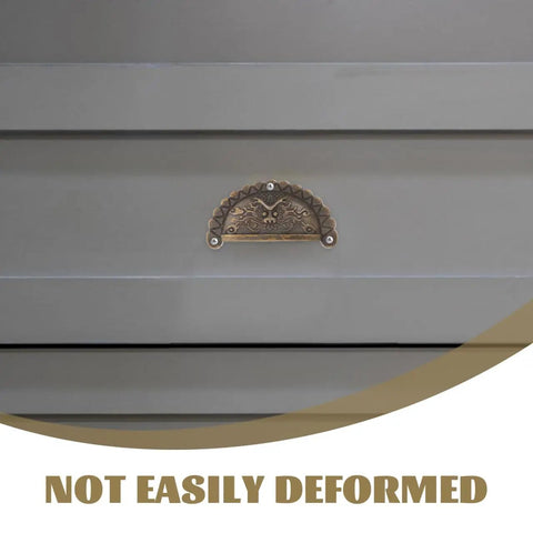 Antique Bronze Lion Head Cabinet Pulls 2.75 Inch Vintage Half Round Dresser Handles installed on a cabinet drawer