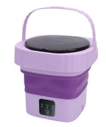 Collapsible Mini Washing Machine With Six Liters And Dual Cycle Options Great For Dorms Or Rvs Easy To Snap Down And Grab On The Go With Hidden Carry Handle For Quick Storage in purple with lid.