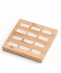 Straight Up The Coolest Wooden Ring Storage Tray With 15 Grids And Soft Velvet Lining To Keep Your Bling Organized On Vanity Or Dresser For Earrings And Bracelets, showing a bamboo tray with white cushioning.