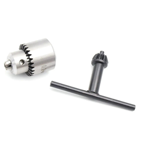 Upgrade Your Toolkit With This Durable Electric Drill Collet Set Perfect For Compact DIY Projects And Heavy Duty Stuff. Featuring 4mm Stainless Steel Construction And Includes Chuck Wrench For Easy Grip On Routers And Milling Machines No Matter If You. Stainless steel drill collet and black chuck wrench for precision tool applications.