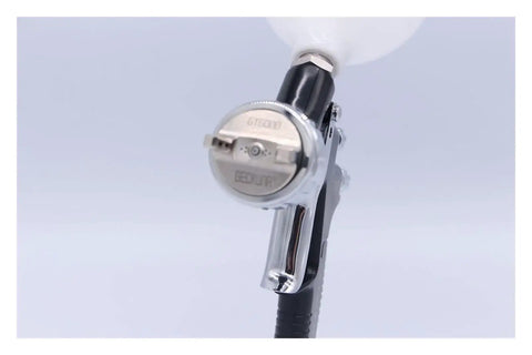 Close-up of Professional Grade Heavy Duty Auto Paint Spray Gun With Precision Nozzle and adjustable fan pattern.