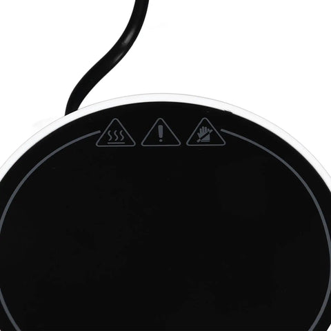 This Solid Electric Mug Warmer Boasts Four Heat Presets To Keep Your Daily Brew Piping Hot All Day Long Featuring Smart Auto Shut Off Protection And Fast Heating With A Sleek White Top For Desk Setup showing button interface with warning icons.