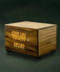 Wooden box on 2.5 Inch Heavy Duty Polyurethane Caster Wheels Pack Of 4, 2000 lb total capacity labeled on side, showcasing load limit.