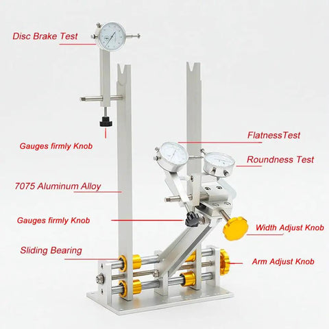 Beefy Wheel Truing Stand For Bicycle Adjustment And Rim Truing With Pro Grade And Adjustable Rim Width 50 To 200mm For MTB Road BMX And City Bikes Made From 7075 Aluminum Alloy Includes Roller Head And Three Test Tables For Brake Disc Alignment shown with gauges and adjust knobs