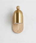 E26 E27 Indoor Wall Sconce Modern Nordic Lamp Gold Metal Shade for Bedroom Bedside Hallway Living Room Minimalist Ash Light Fixture(7.1”(18cm))(7.1”(18cm)) with brass shade and wood base.