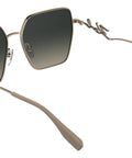 Dope Rose Gold Womens Eyewear Featuring Straight Fire Gradient Brown Tints With Goated 100 Percent Uv Shielding Rx Compatible Frames And Killer Cushion Comfort For Legendary Street Style showing a side view of rose gold sunglasses with gradient lenses.